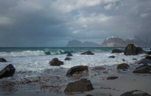  Haukland Beach Norway white sand and mountains Kvalvika Beach hike in Lofoten Ramberg Beach Lofoten white sand Bunes Beach Lofoten mountain views Uttakleiv Beach Lofoten Arctic beach Sola Beach Stavanger Norway Hoddevik Beach Norway surf beach Norway beaches with white sand Best beaches in Norway summer 