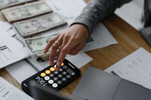 how to save money while traveling, ways to save money while traveling, money saving travel tips, travel money saving tips, save money on travel, budget travel tips, travel budget tips, cheap travel tips, affordable travel tips, cheap ways to travel, travel for less, pack light, local grocery stores, eat where locals eat, use public transport while traveling, avoid tourist traps, free things to do while traveling, track spending while traveling, hidden travel costs, airport food, baggage fees, foreign transaction fees, travel during shoulder season, travel without overspending 