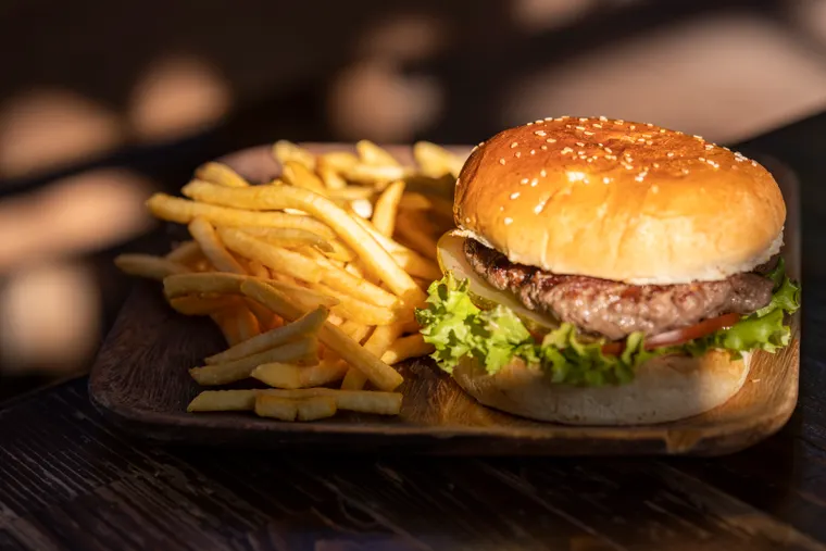 Burger and fries, the kind served at Seven Brothers at the Mill in Kahuku, north shore oahu restaurants