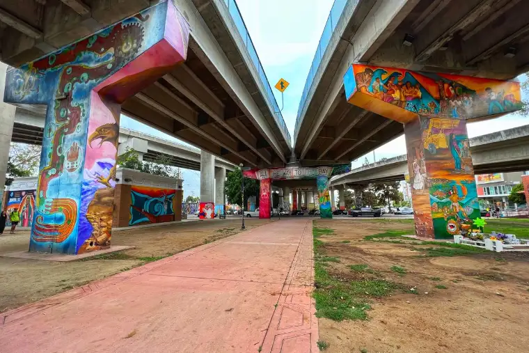 Murals on the bridge pillars at Chicano Park in San Diego