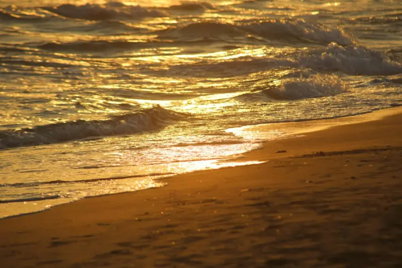 Lake Michigan beach at sunset near the Gold Coast