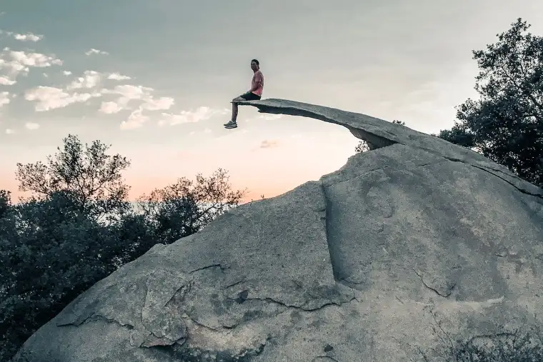 Hiker on Potato Chip Rock on Mount Woodson near San Diego